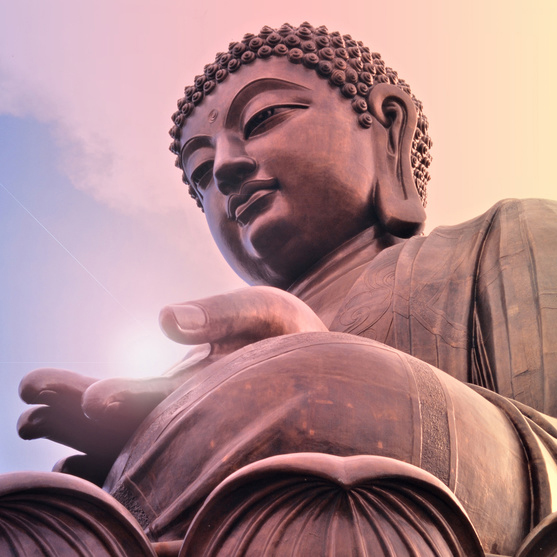 Buddha statue at Po Lin monastery Lantau island Hong Kong. Bright light source in hand.